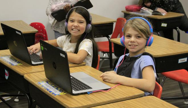 students using laptops