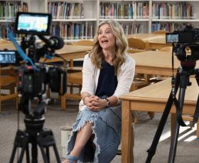 Teacher being interviewed