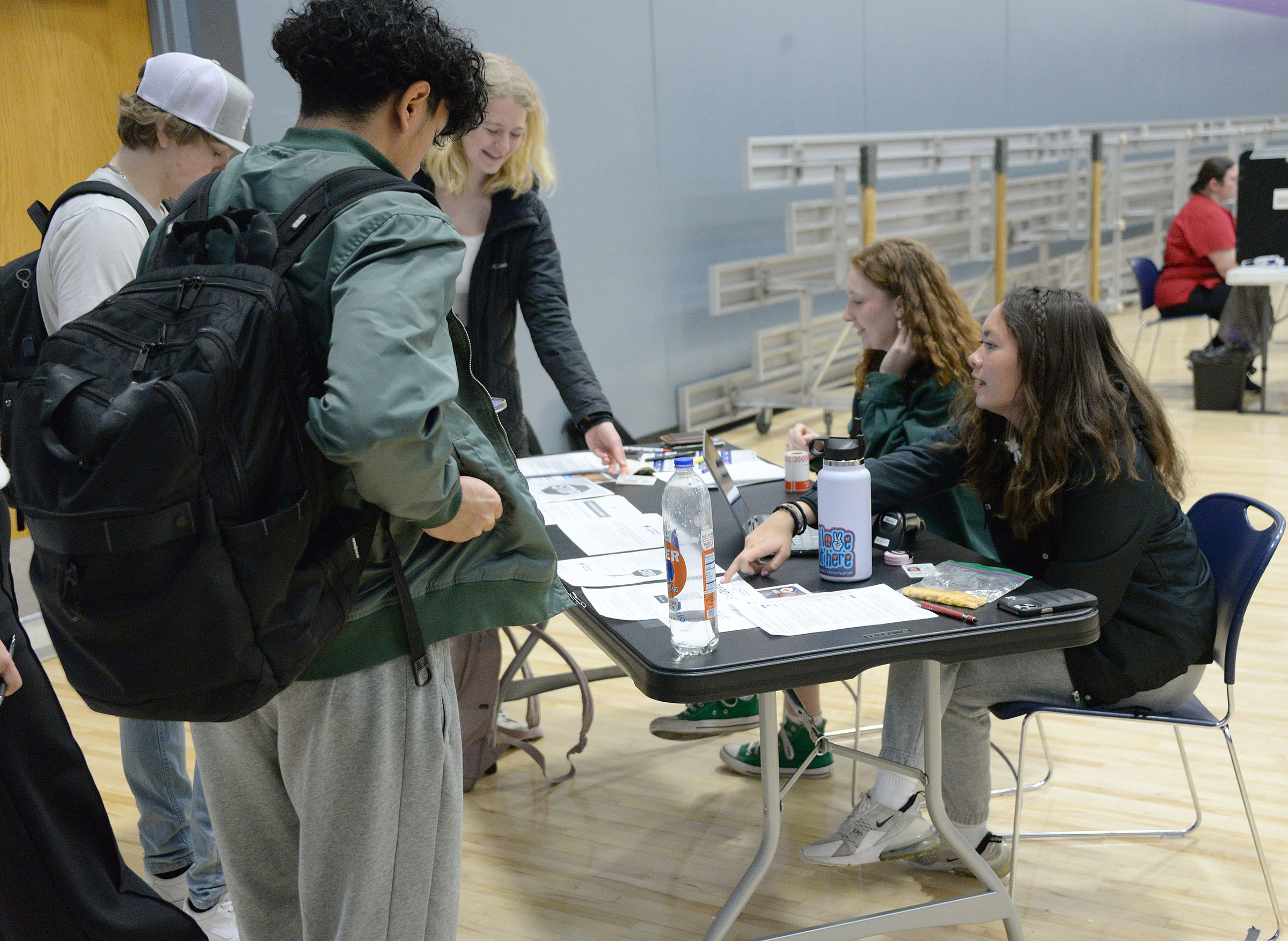 NHS students check in donors