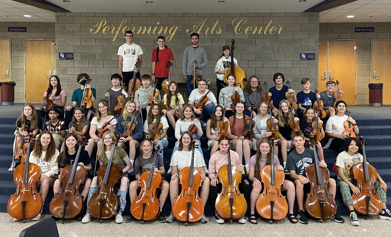 Orchestra students pose for photo