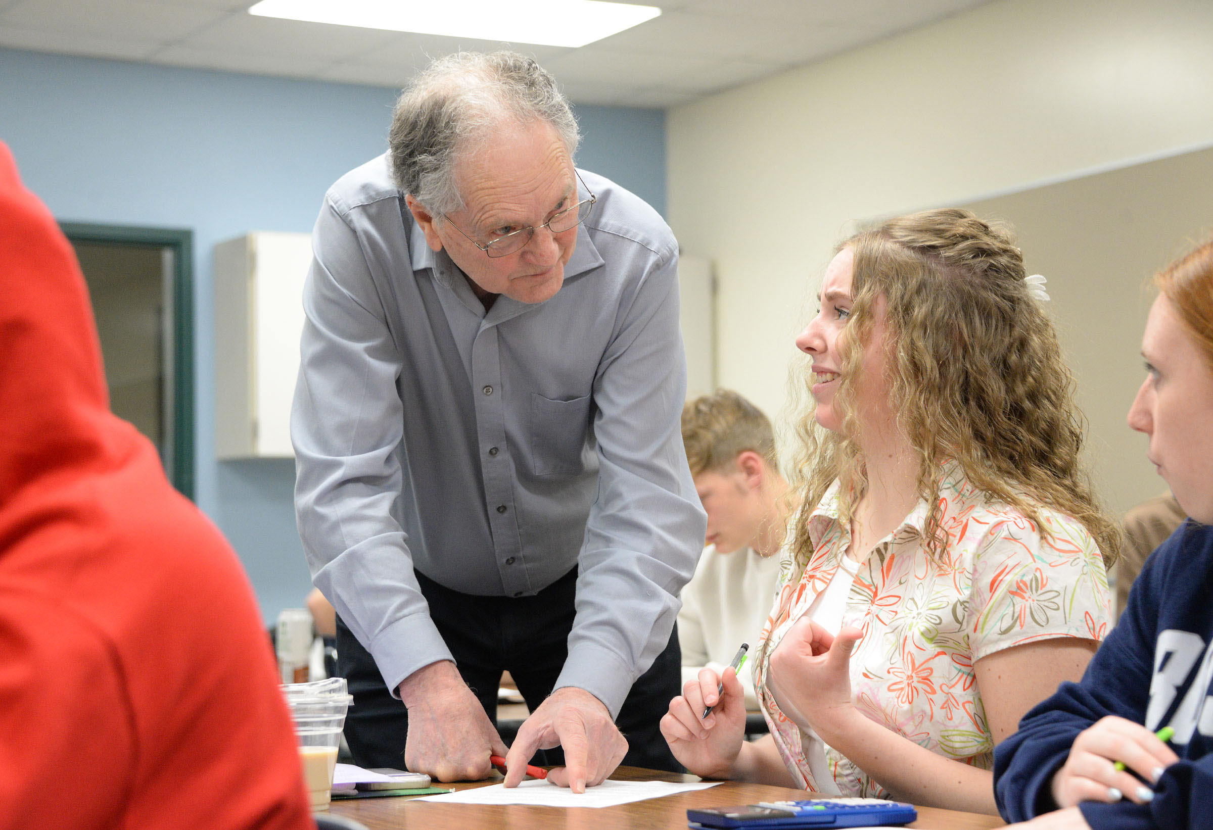 Teacher instructs students