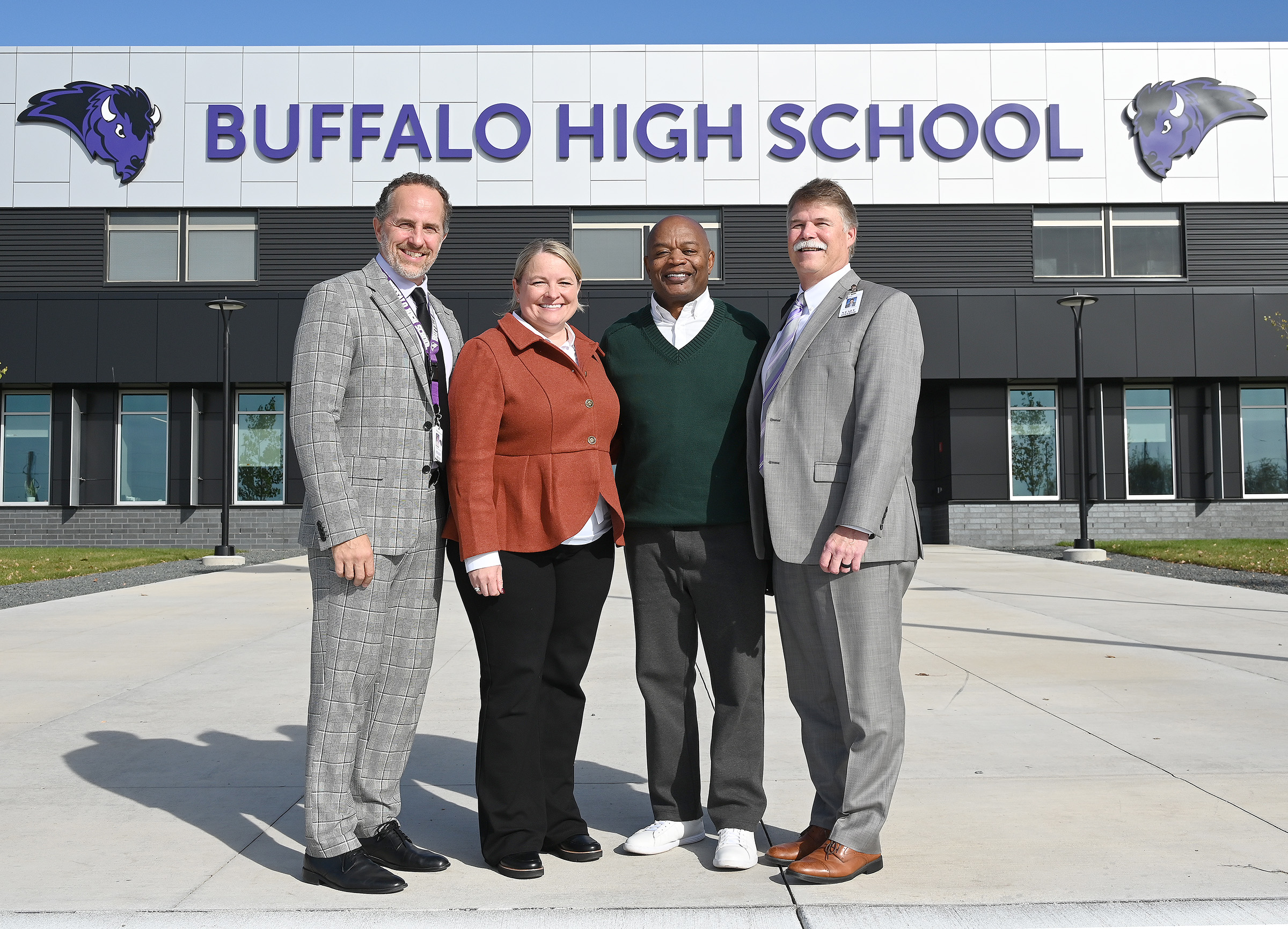 Commissioner and BHM leaders stand in front of BHS