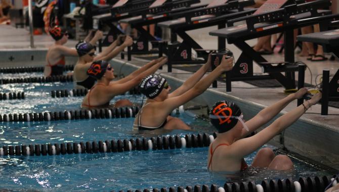 swimmers competing