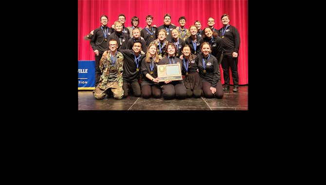 Cast and crew with award