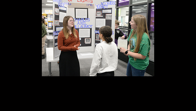 Student presents historical exhibit