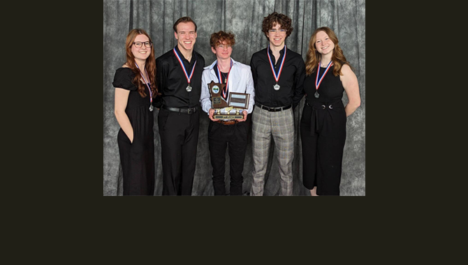 Students hold second-place trophy