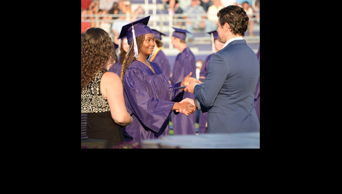 Student receives diploma