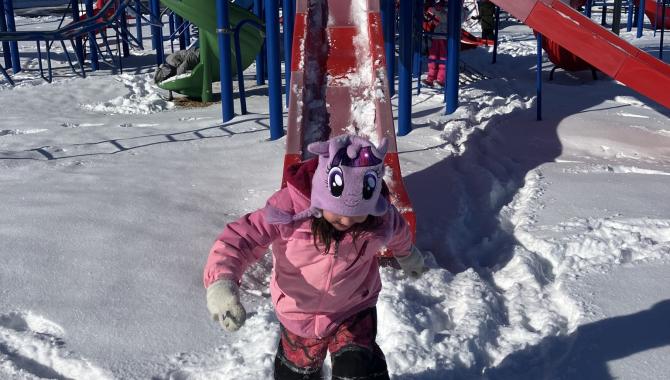 Student on playground in winter