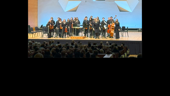 Orchestra on stage at the state showcase
