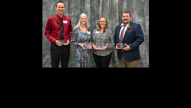 Teachers holding awards