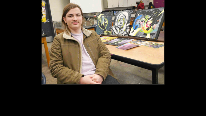 Student with artwork