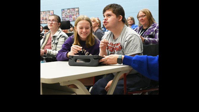 Students interact in a Unified class