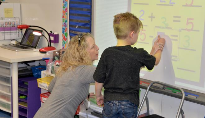 teacher with student