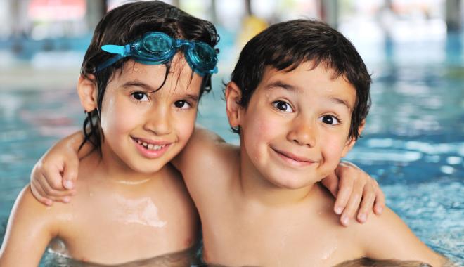 Two friends at open swim in pool