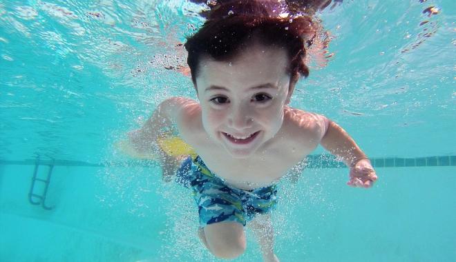 Young child swimming
