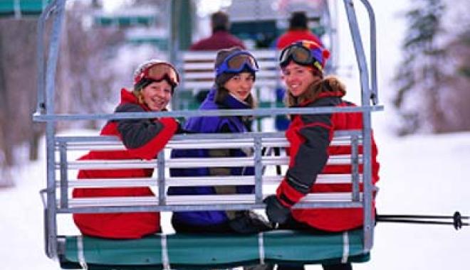 Boys on a ski chair lift