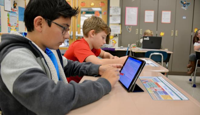 male student on a tablet