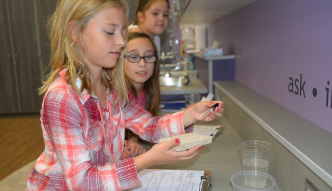 students testing water