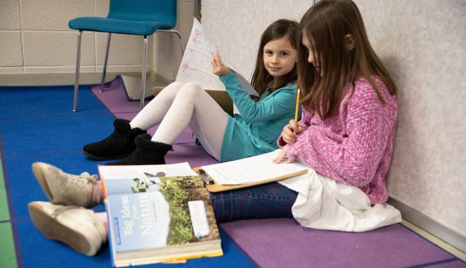 Girls working together in class