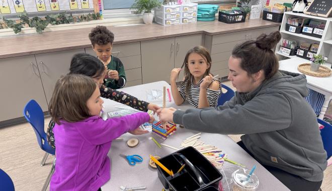 Parent helping in class