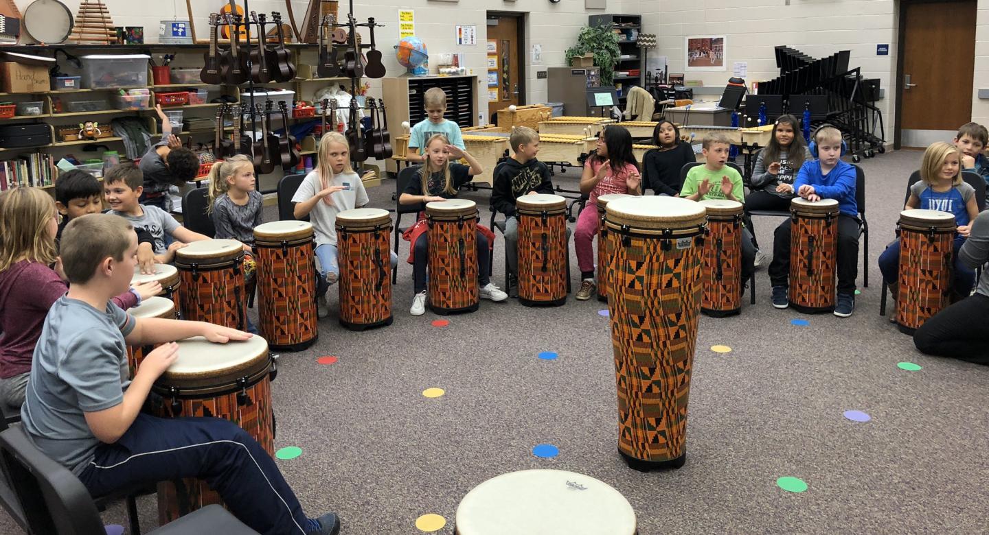 students drumming photo