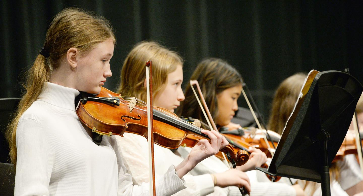 Students playing violin