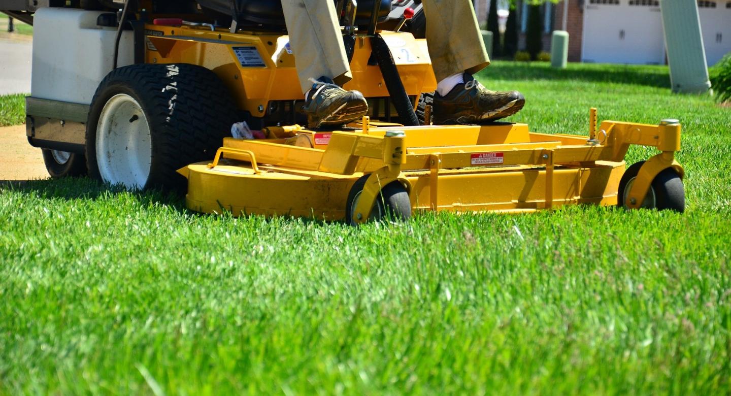 mowing grass