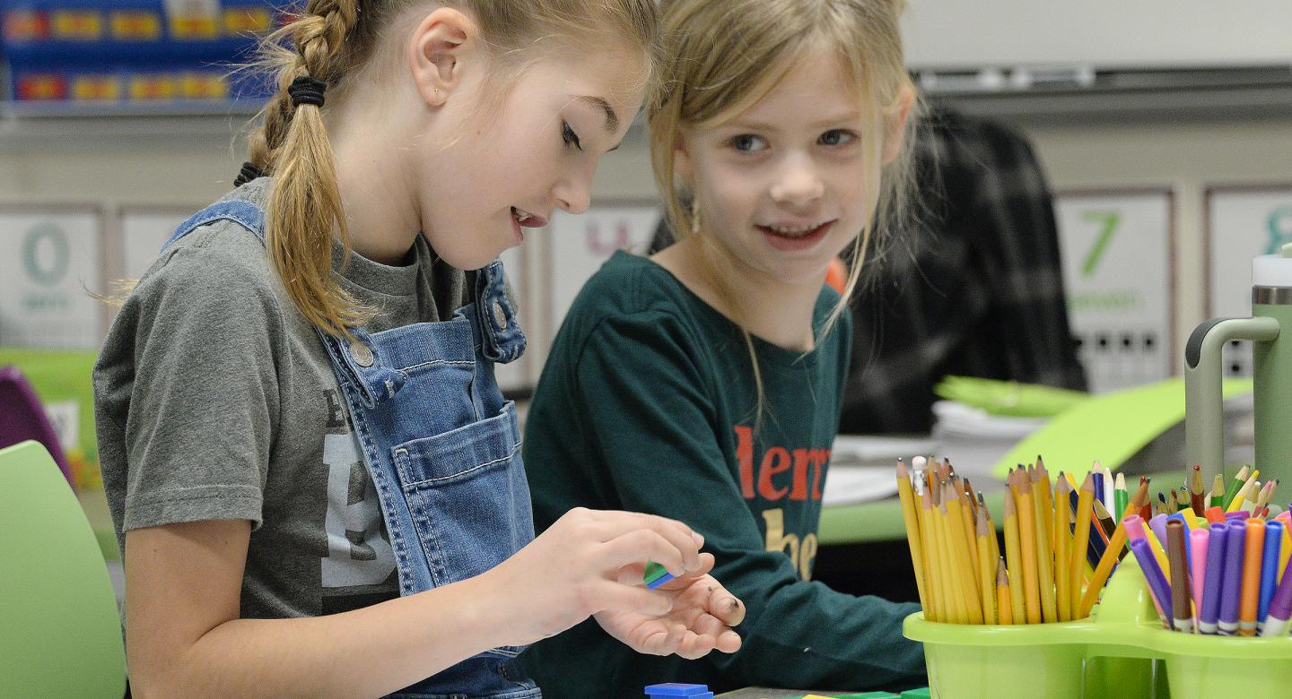 Girls Stacking Blocks