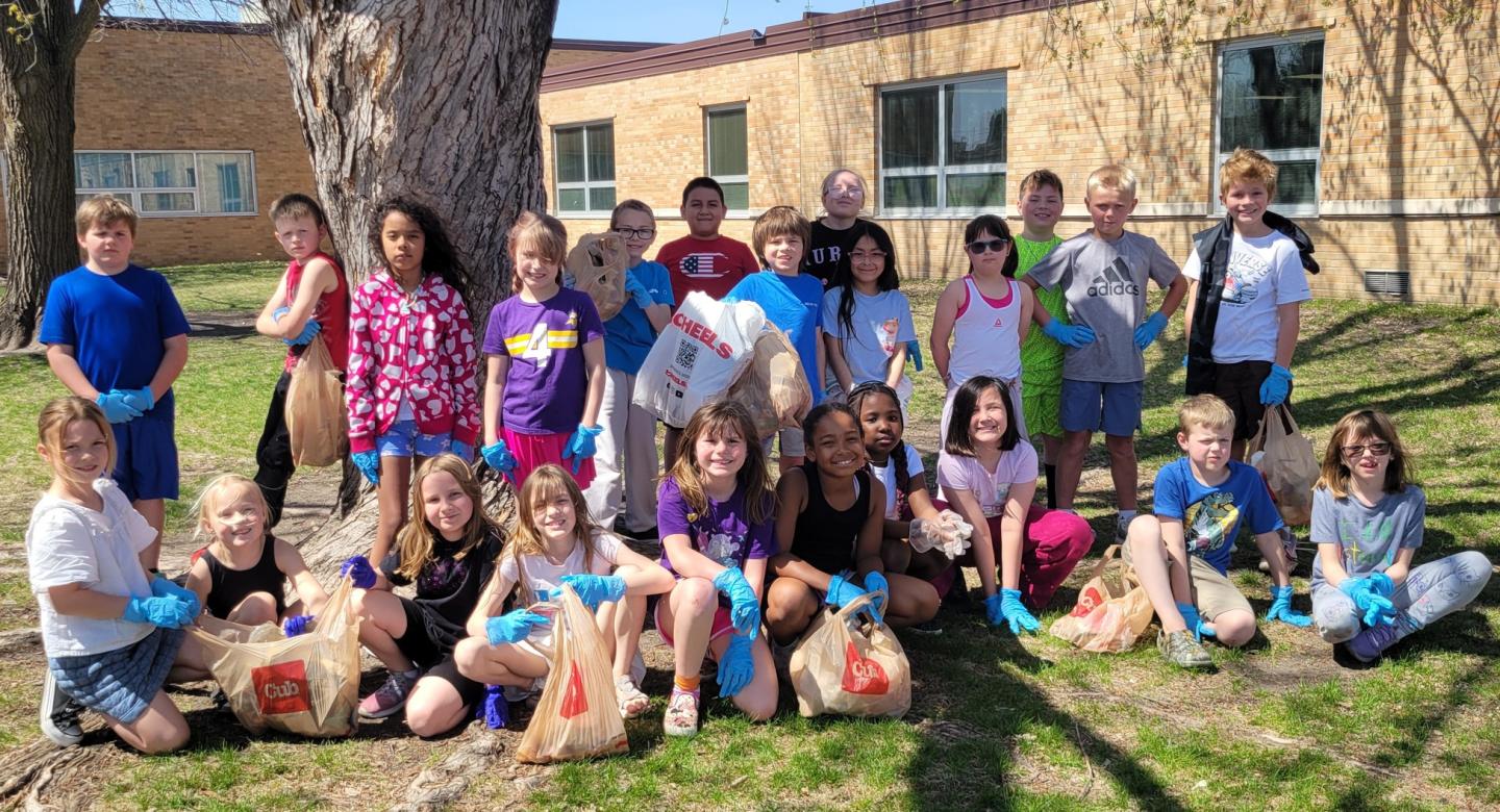 Students picking up trash on Earth Day