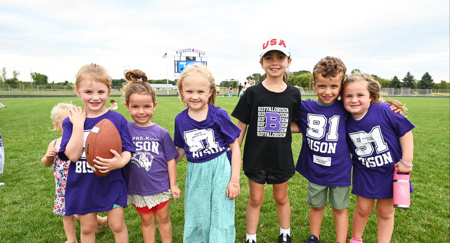 Young students wearing B1 Bison shirts