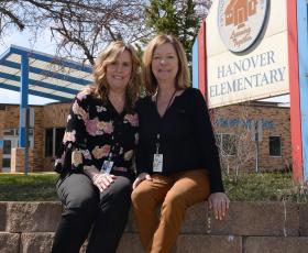 Bryan and Gilchrist outside Hanover Elementary