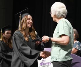 Student receives diploma