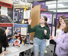 Student presents research exhibit