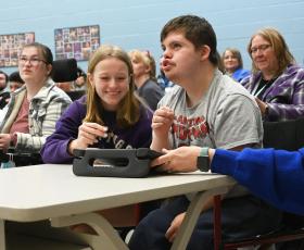 Students interacting in a Unified class